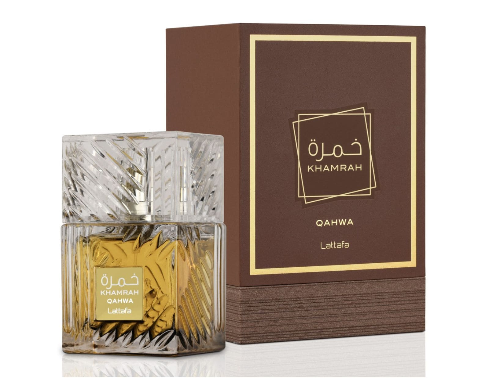 Botella de colonia árabe unisex de cristal geométrico y líquido color ámbar sobre superficie de mármol, estilo moderno similar a Lattafa Khamrah.